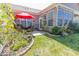 Lush backyard with a well-maintained lawn and patio area for outdoor activities and relaxation at 8724 Faulkner Dr, Indianapolis, IN 46239