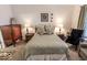 Inviting bedroom with plush carpet and warm, natural light at 8724 Faulkner Dr, Indianapolis, IN 46239