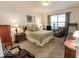 Relaxing bedroom with neutral walls, carpet flooring and a window at 8724 Faulkner Dr, Indianapolis, IN 46239
