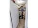 Walk-in closet boasts ample storage with shelving, hanging racks, and organized storage containers at 8724 Faulkner Dr, Indianapolis, IN 46239
