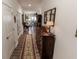 Hallway featuring hard wood flooring with access to other rooms in the house at 8724 Faulkner Dr, Indianapolis, IN 46239