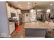Stylish kitchen featuring stainless steel appliances, white cabinetry, and granite countertops at 8724 Faulkner Dr, Indianapolis, IN 46239