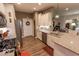 Beautiful kitchen with modern appliances, white cabinets, granite countertops, and a tiled backsplash at 8724 Faulkner Dr, Indianapolis, IN 46239