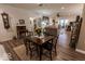 Spacious living room features wood floors, comfortable seating and plenty of natural light at 8724 Faulkner Dr, Indianapolis, IN 46239