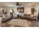 Inviting living room showcases wood floors, comfortable seating, and natural lighting at 8724 Faulkner Dr, Indianapolis, IN 46239
