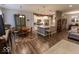 Bright open floor plan featuring a modern kitchen, dining area, and living room at 8724 Faulkner Dr, Indianapolis, IN 46239
