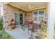 Charming covered patio with brick accents, offering a relaxing outdoor living space at 8724 Faulkner Dr, Indianapolis, IN 46239