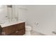 Modern bathroom with a sleek vanity, updated fixtures and bright light at 877 N East St # 103, Indianapolis, IN 46202