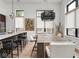 Elegant dining area with stylish lighting and ample seating for entertaining at 877 N East St # 103, Indianapolis, IN 46202