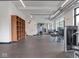Well-equipped gym with weight machines, free weights, and mirrored wall for a comprehensive workout experience at 877 N East St # 103, Indianapolis, IN 46202