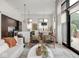 Bright and airy living room with large windows and modern decor at 877 N East St # 103, Indianapolis, IN 46202
