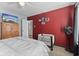 Bright, well-lit bedroom with a view, a crib, and ample space at 10404 Kings Gap Way, Indianapolis, IN 46234