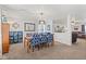 Open dining room with a modern light fixture, and open sightlines to adjacent living areas at 10404 Kings Gap Way, Indianapolis, IN 46234