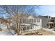 Charming two-story home with blue shutters and covered front porch at 10404 Kings Gap Way, Indianapolis, IN 46234