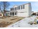 Two-story home with a covered porch, two-car garage, and traditional white siding at 10404 Kings Gap Way, Indianapolis, IN 46234