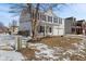 Traditional two-story home with a covered porch, white siding, and blue shutters at 10404 Kings Gap Way, Indianapolis, IN 46234