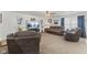 Cozy living room with comfortable seating, neutral carpet, and decorative accents at 10404 Kings Gap Way, Indianapolis, IN 46234