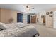 Large main bedroom featuring carpet, ceiling fan, and TV set at 10404 Kings Gap Way, Indianapolis, IN 46234