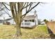 View of backyard offers the home, patio and covered porch at 10669 Springston Ct, Fishers, IN 46037