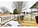 Patio offers table, chairs, grill and some snow at 10669 Springston Ct, Fishers, IN 46037