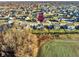 Aerial shot of home highlighting its location within a vibrant, Gathering-friendly community near green space at 1083 Margate Dr, Greenwood, IN 46143