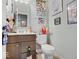 Whimsical bathroom featuring colorful decor, playful artwork, and a unique vanity design for a fun and imaginative space at 1083 Margate Dr, Greenwood, IN 46143