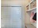 Functional entryway with coat rack, storage baskets and sliding door closet for optimized storage and organization at 1083 Margate Dr, Greenwood, IN 46143