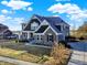 A picturesque two-story home featuring a brick facade and a spacious three car attached garage at 1083 Margate Dr, Greenwood, IN 46143