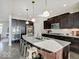 A well-appointed kitchen with a large island, stainless steel appliances, and ample counter space for food preparation at 1083 Margate Dr, Greenwood, IN 46143