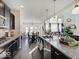 Modern kitchen with stainless steel appliances, granite countertops, and an open layout perfect for entertaining at 1083 Margate Dr, Greenwood, IN 46143