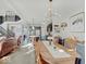 Open concept living space seamlessly connects the dining area to the modern kitchen for easy entertaining and Gathering living at 1083 Margate Dr, Greenwood, IN 46143