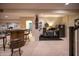 Finished basement with a custom bar area, lounge area, desk space, and workout area at 12991 Pennington Rd, Fishers, IN 46037