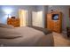Comfortable bedroom with two dressers and neutral decor, offering a serene atmosphere at 12991 Pennington Rd, Fishers, IN 46037