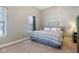 Bedroom with carpet flooring, neutral walls, and natural light from a window at 1390 Greenfield Ave, Noblesville, IN 46060