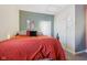 Cozy bedroom with a comfortable bed, ambient lighting, and ample closet space at 1390 Greenfield Ave, Noblesville, IN 46060