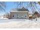 Charming home with a snow-covered yard at 1390 Greenfield Ave, Noblesville, IN 46060