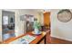 Stylish kitchen with stainless steel refrigerator adjacent to dining area, creating open flow at 1390 Greenfield Ave, Noblesville, IN 46060