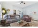 Comfortable living room with a plush sofa, recliner, and stylish decor, creating a relaxing space at 1390 Greenfield Ave, Noblesville, IN 46060