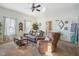 Bright living room with neutral tones, comfortable seating, and natural light, creating a cozy atmosphere at 1390 Greenfield Ave, Noblesville, IN 46060