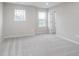 Spacious bedroom with plush carpeting, and a double window at 14390 Bishop Birch Pl, Carmel, IN 46032