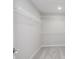 Walk-in closet with built-in shelving and carpet flooring at 14390 Bishop Birch Pl, Carmel, IN 46032
