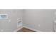 A well-lit laundry room with hookups for both washer and dryer at 14390 Bishop Birch Pl, Carmel, IN 46032