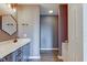 Bathroom with double sinks, vanity and a shower with a tub at 15486 Dusty Trl, Noblesville, IN 46060