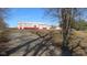 Exterior view of large barn building with red and white accents and a sliding door at 1588 E Us Highway 136, Hillsboro, IN 47949