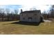 Two-story home featuring a well-maintained lawn and a spacious backyard at 1588 E Us Highway 136, Hillsboro, IN 47949