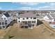 Beautiful aerial view of home with mature landscaping, neutral paint, and back yard deck at 15969 Sonnet Park Ln, Westfield, IN 46074