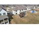A stunning two-story home featuring a deck with pergola, complemented by a lush backyard at 15969 Sonnet Park Ln, Westfield, IN 46074