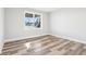 Basement bedroom area with window and luxury vinyl plank flooring at 15969 Sonnet Park Ln, Westfield, IN 46074