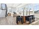Open living space showcasing stylish dining and living area with fireplace feature at 15969 Sonnet Park Ln, Westfield, IN 46074