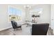 Bright and airy office with sleek décor, large windows, and modern light fixture at 15969 Sonnet Park Ln, Westfield, IN 46074